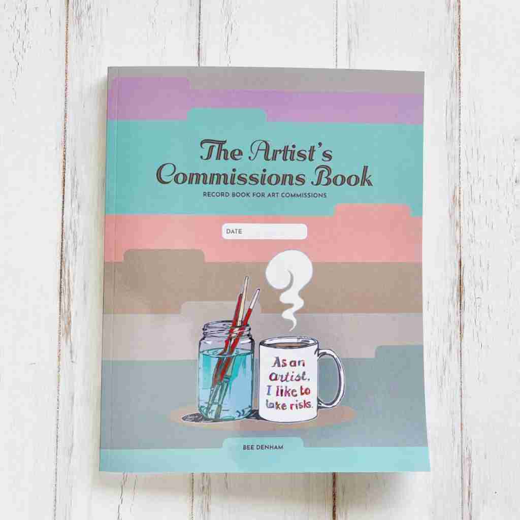 Front cover of The Artist's Commissions book on a white painted background