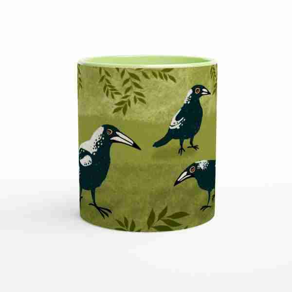 Mug with Australian magpies in a garden design