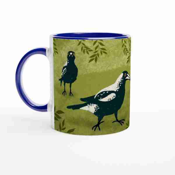 Blue coffee mug with Australian magpies design